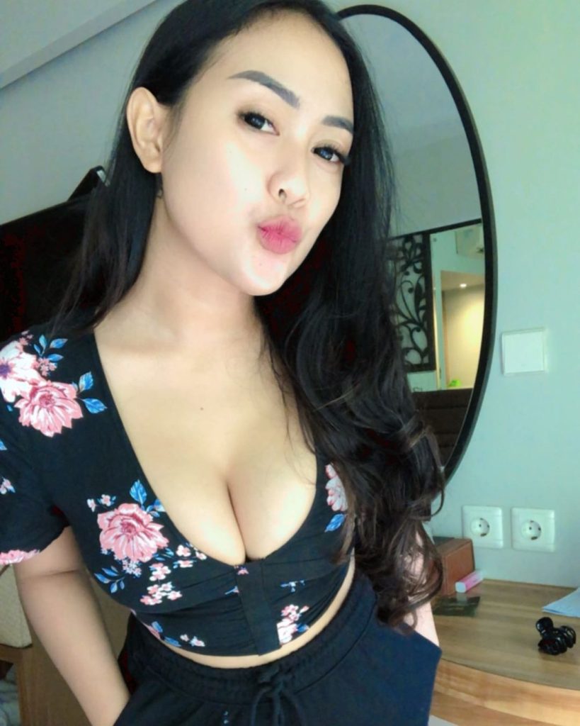 Alt text: Image of Lina, a Kuala Lumpur escort specializing in Malay sex service.